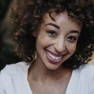 A survivor grins up at the camera