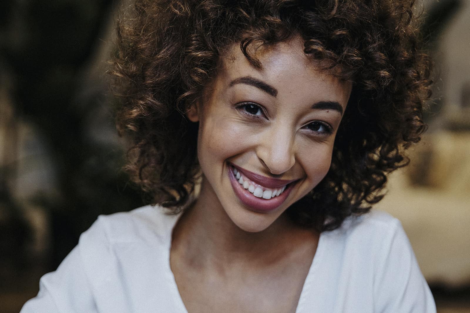 A survivor grins up at the camera