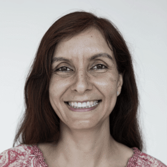 Smiling survivor with auburn hair
